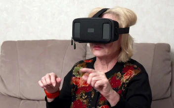 Stock Video Elderly Person Using A Vr Headset For PC
