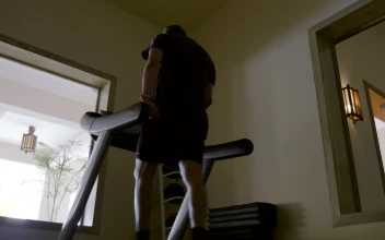 Stock Video Elderly Man Walking On A Treadmill For PC