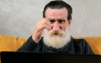 Stock Video Elderly Man Stressed Over Broken Laptop For PC