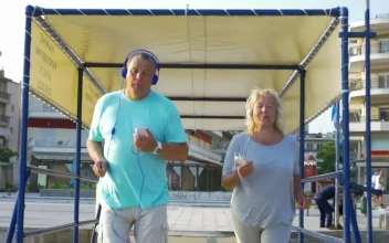 Stock Video Elderly Couple Running Towards The Beach For PC
