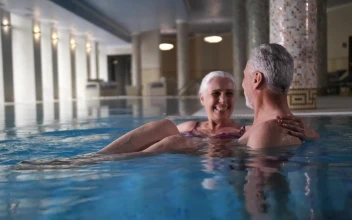 Stock Video Elderly Couple Enjoying Time In The Pool For PC