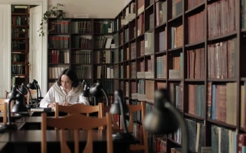 Stock Video Educated Woman Studies For Exam In University Library For PC