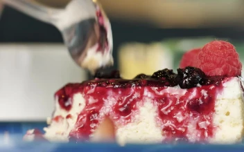 Stock Video Eating Raspberry Cheesecake With A Spoon For PC