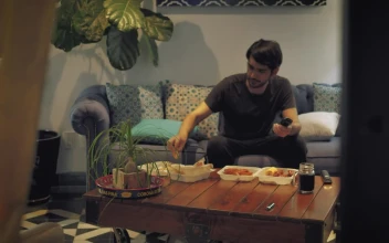 Stock Video Eating Fast Food While Watching Tv For PC