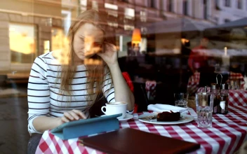Stock Video Eating Cake In A City Cafe For PC