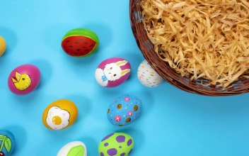 Stock Video Easter Eggs Going To A Basket For PC