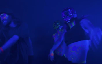 Stock Video Dynamic Choreography Of People With Mask In The Dark For PC