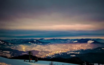 Stock Video Dusk From The Top Of A Snowy And Cloudy Mountain For PC