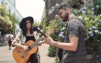 Stock Video Duo Playing Music Together On A Colonial Street For PC
