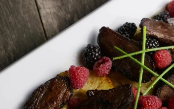 Stock Video Duck Cooked In A Sweet And Sour Dish With Fruit For PC