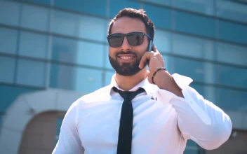 Stock Video Dubai Businessman In Sunglasses On Mobile Phone For PC