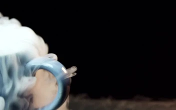 Stock Video Dry Ice Smoke From A Coffee Cup For PC
