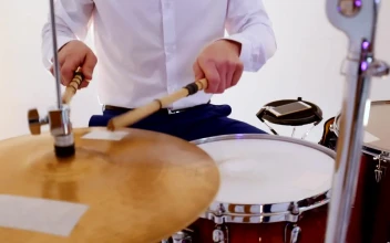 Stock Video Drummer In Shirt And Bow Tie Playing Drums For PC