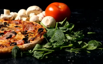 Stock Video Dropping Mushrooms Onto A Pizza For PC
