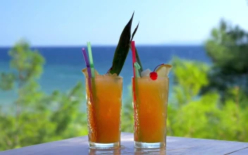 Stock Video Dropping Ice Into A Cocktail For PC