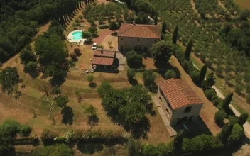 Stock Video Drone Flying Over Remote Houses For PC