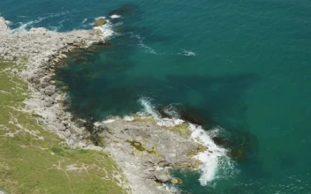 Stock Video Drone Flying Down Towards The Cliffs For PC