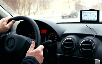 Stock Video Driving With A Gps Attached To The Window For PC