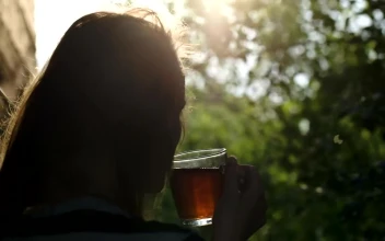 Stock Video Drinking Tea On A Cool Morning For PC