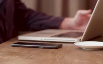 Stock Video Drinking Coffee And Paying With Mobile Phone Closeup For PC