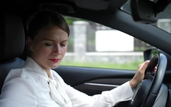 Stock Video Drinking A Coffee While Driving Through Town For PC