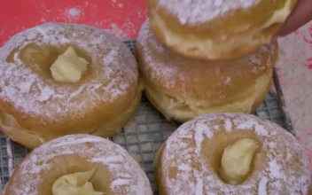 Stock Video Donuts With Icing Sugar Filled With Pastry Cream For PC