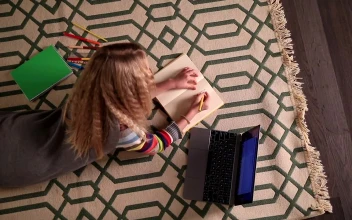 Stock Video Doing Homework With A Laptop For PC
