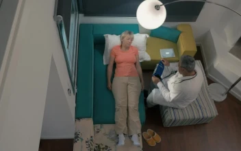 Stock Video Doctor Visiting A Woman At Home For PC