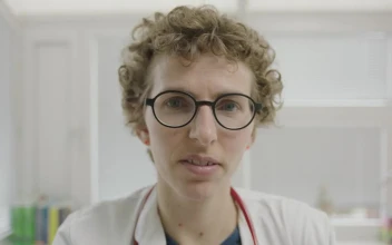 Stock Video Doctor Putting On A Face Mask For PC