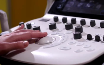 Stock Video Doctor Preparing An Ultrasound For PC