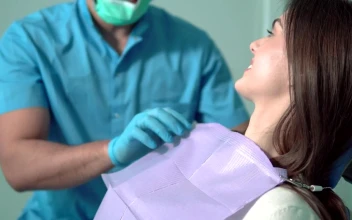 Stock Video Doctor Prepares Patient For Exam With Face Mask For PC