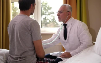 Stock Video Doctor Listening To A Heartbeat At Hospital For PC