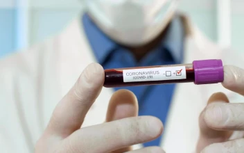 Stock Video Doctor Holding A Blood Sample With Coronavirus For PC