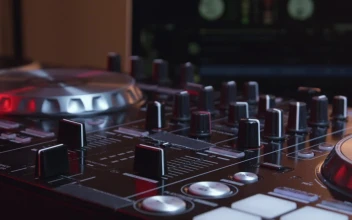 Stock Video Dj Using A Mixer Table At A Party For PC