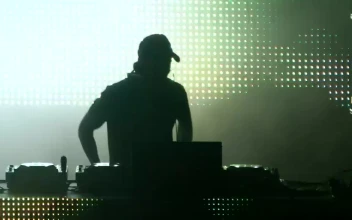 Stock Video Dj Playing On A Stage With Led Screens For PC