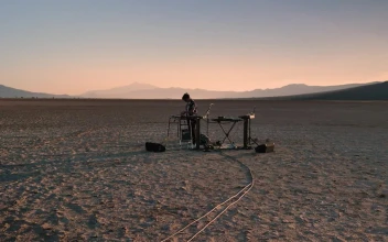 Stock Video Dj Playing Music In The Middle Of A Sunny Desert For PC