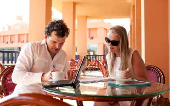 Stock Video Discussing Business Plans Over Coffee For PC