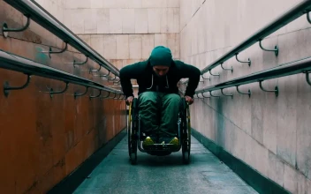 Stock Video Disabled Man Going Up A Ramp For PC