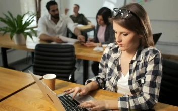 Stock Video Digital Marketing Pro Works On Laptop And Smiles For PC