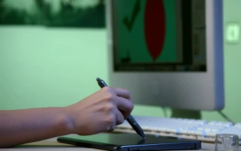 Stock Video Designer Using A Graphics Tablet For PC