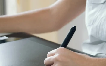Stock Video Designer Using A Graphical Pen And A Face Mask For PC