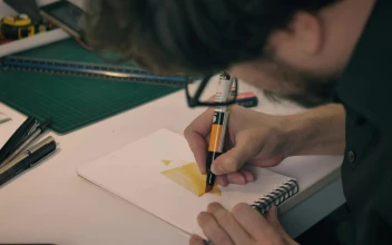 Stock Video Designer In His Studio Giving Color To His Strokes In For PC