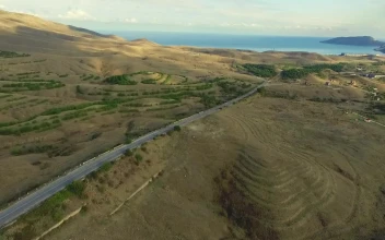 Stock Video Desert Road Leading To The Open Ocean For PC