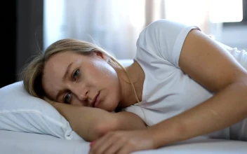 Stock Video Depressed Woman Laying In Bed For PC