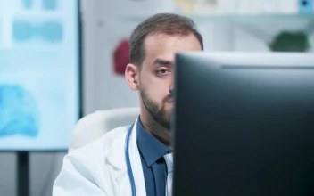 Stock Video Depressed Medical Professional Working On Pc In Lab For PC