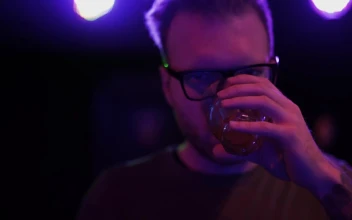 Stock Video Depressed Man Drinking In A Nightclub For PC
