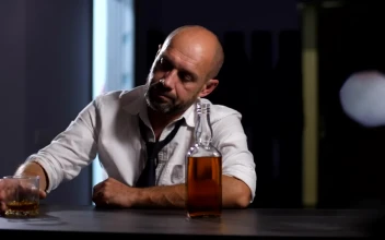 Stock Video Depressed Man Drinking At A Bar For PC
