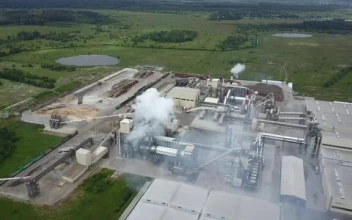 Stock Video Mixkit Flying Over A Large Factory Smal For PC