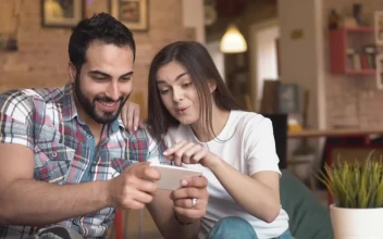 Stock Video Friends Enjoy Mobile Gaming On Break For PC
