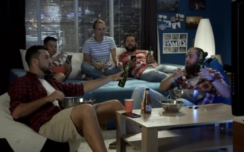 Stock Video Friends Drinking And Enjoying Sports On Television For PC
